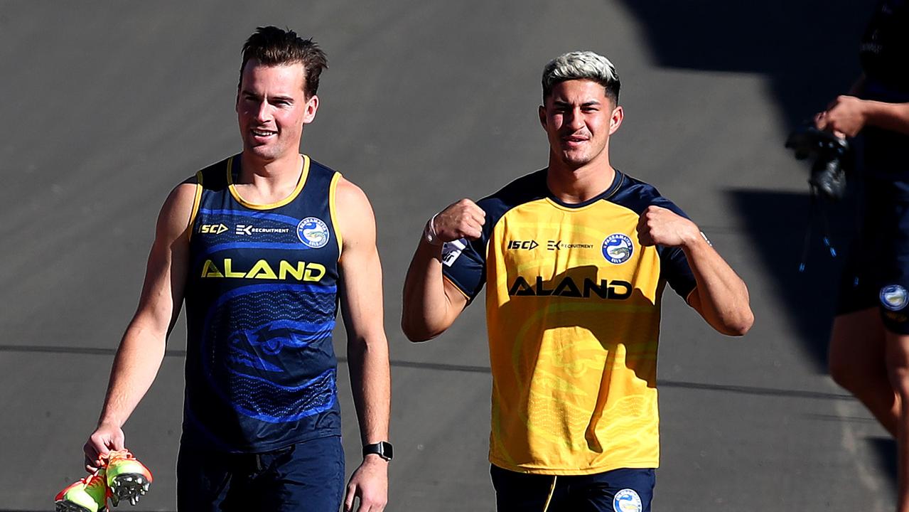 Parramatta Eels hold a training session at Kellyville Memorial Park after their first loss of the season to the Roosters over the weekend. Clint Gutherson (L) and Dylan Brown (R) arrive for training. Picture: Toby Zerna