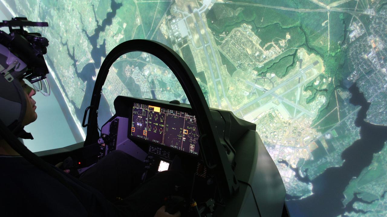 An image of an advanced flight simulators used to train F-35 pilots.