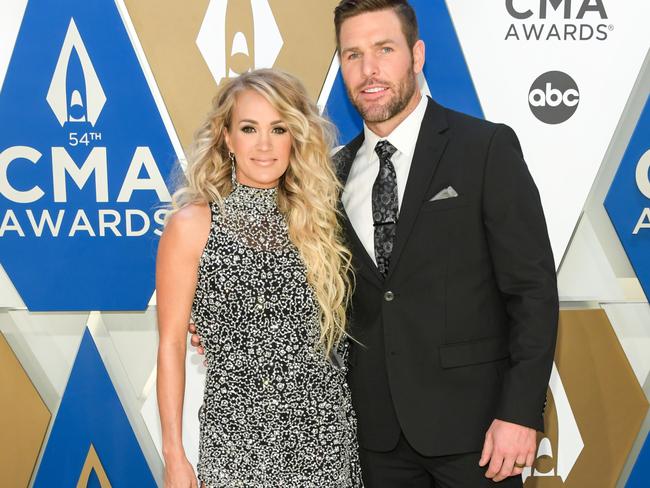 Carrie Underwood and Mike Fisher attend the 54th annual CMA Awards at the Music City Center on November 11, 2020. Picture: Jason Kempin