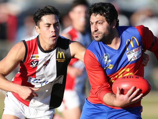 Goulburn Valley FL, Round 8, Seymour Lions V Benalla Saints, at Seymour,  Saad Saad, 5,  Seymour Lions  &  David Mennen, 2, Benalla Saints,   Picture Yuri Kouzmin