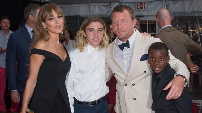 NEW YORK, NY - AUGUST 10: (L-R) Jacqui Ainsley, Rocco Ritchie, Guy Ritchie and David Ciccone Ritchie attend 