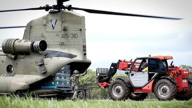 The Australian Defence Force deployed two Chinook helicopters and two AW139 helicopters on December 19 for the mandatory evacuation of 300 people from Wujal Wujal, on the Bloomfield River, following devastating flooding. Picture: ADF