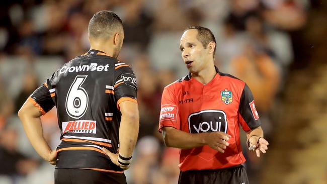 SYDNEY, AUSTRALIA — MARCH 23: Referee Ashley Klein talks to Tigers Captain Benji Marshall after he awarded a penalty to the Broncos in Golden Point extra time during the round three NRL match between the Wests Tigers and the Brisbane Broncos at Campbelltown Sports Stadium on March 23, 2018 in Sydney, Australia. (Photo by Mark Evans/Getty Images)