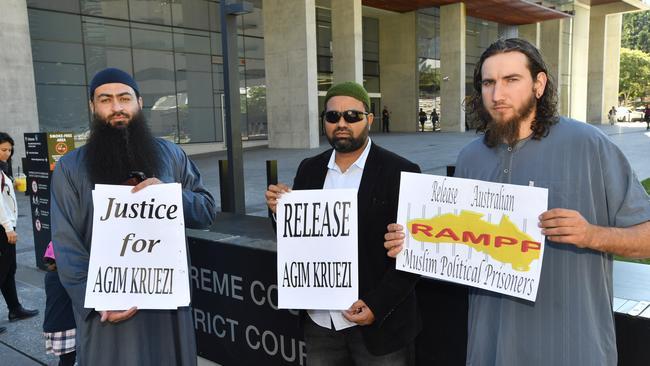 Supporters of Qazim Kruezi’s brother Agim Kruezi are seen outside the Brisbane Supreme Court in Brisbane in 2018.