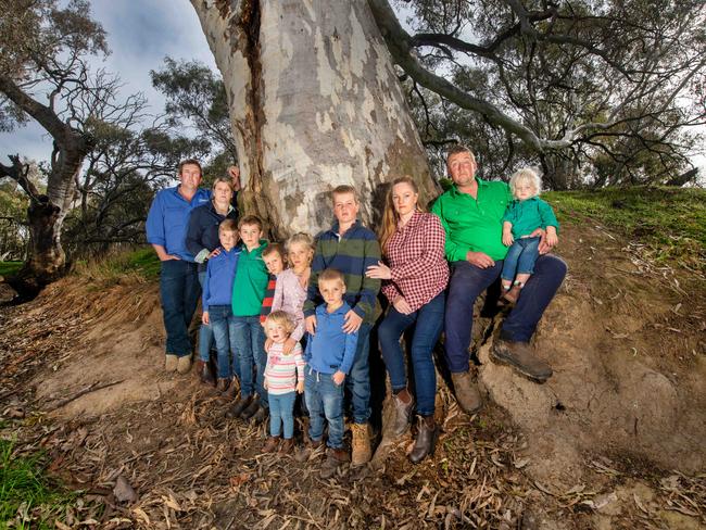 Trent, Katherine, Henry and Charles Carter with David, Marianne and baby Adele Duxson, Jack Duxson and Scott Duxson, Marcia McIntyre, Armand and baby Nathan Duxson at the sight of proposed transmission lines near Kanya. Picture: Rob Leeson