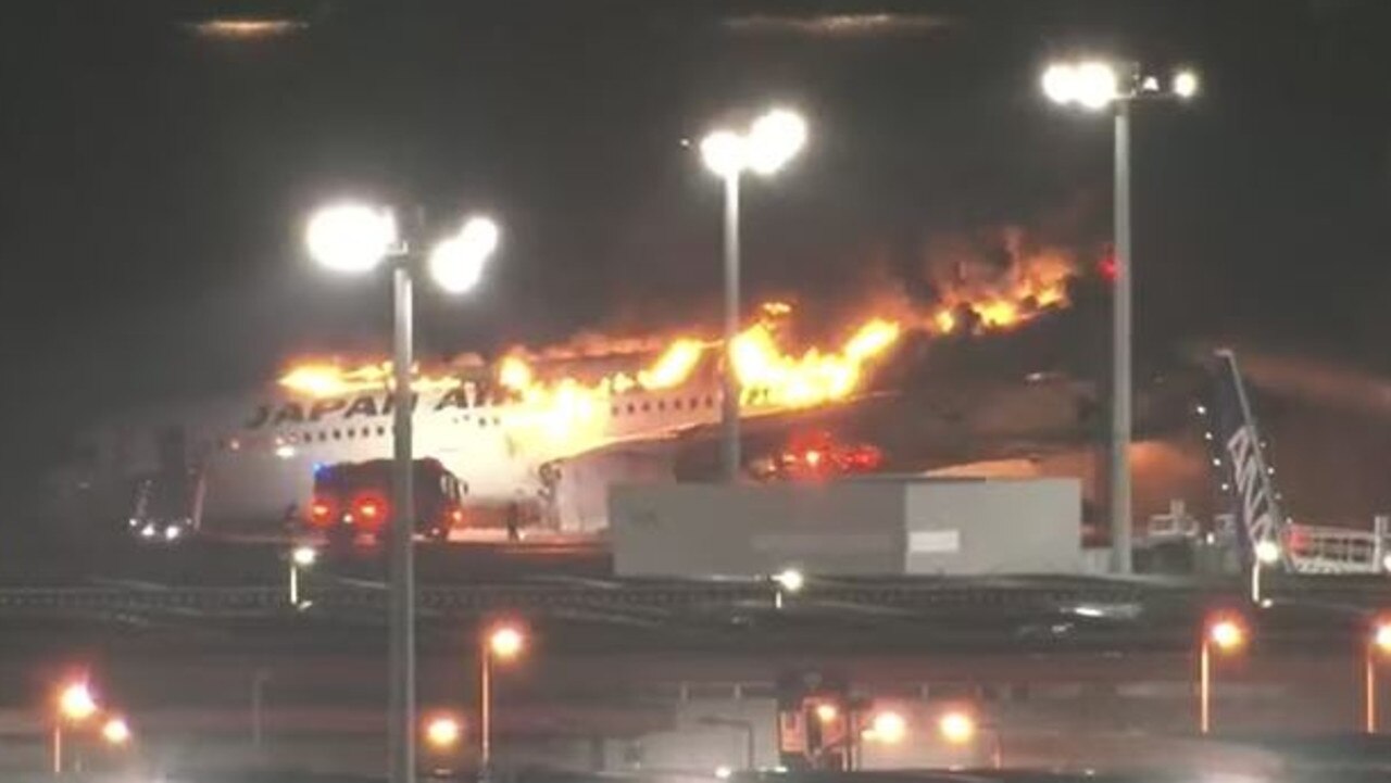 A Japan Airlines plane has burst into flames while it landed in Toyko. Picture: NHK