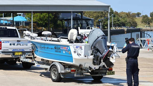 Police inspect the fishing boat that collided with a whale off Botany Bay. Picture: Max Mason-Hubers