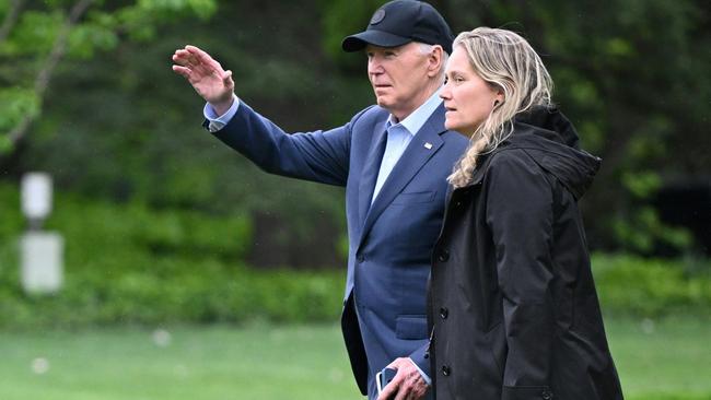 Biden with aide Annie Tomasini in April. Picture: AFP