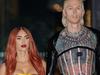 Loved-up couple’s wild gala outfits
