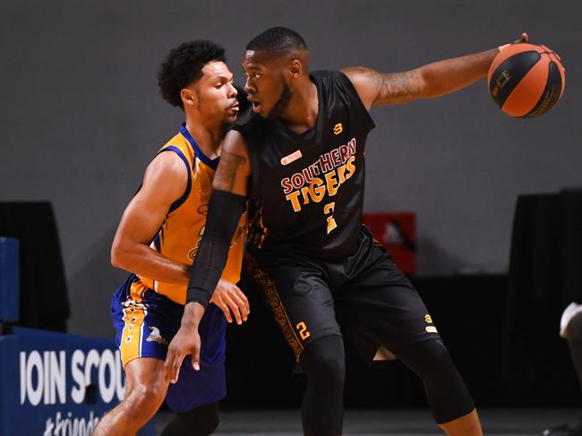 Jalen Richard of the Eagles defends CJ Turnage of the Tigers during the Men's Premier League basketball grand final between Southern Tigers and Forestville at Titanium Securtity Arena Saturday August 18,2018.(Image AAP / Mark Brake)