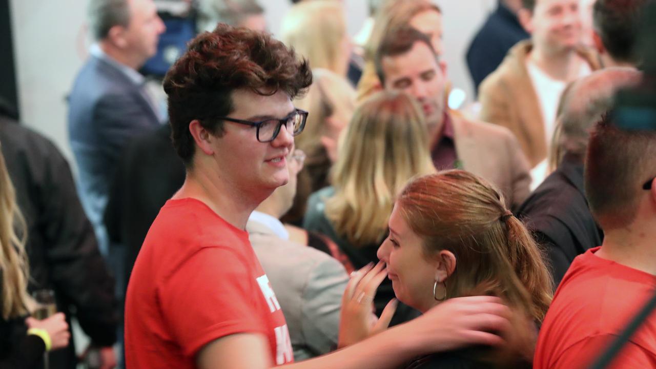 Labor supporters watch the tally count. Picture: David Crosling