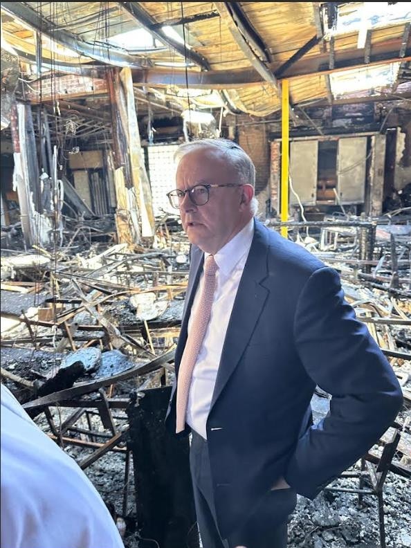 The PM inside the synagogue.