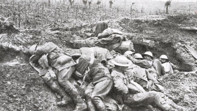 Exhausted stretcher bearers at PasschendaelePicture: National Library of Australia