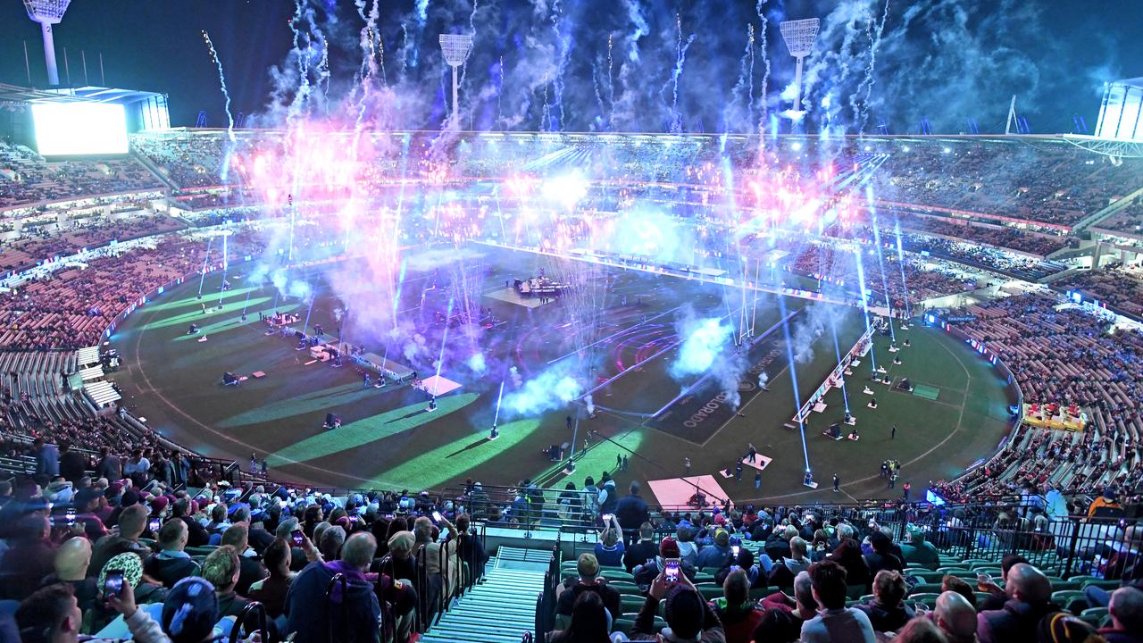 Fans enjoy the pre match fireworks during Game 1 of the 2018 State of Origin series at the MCG in Melbourne, Wednesday, June 6, 2018. (AAP Image/Joe Castro) NO ARCHIVING, EDITORIAL USE ONLY