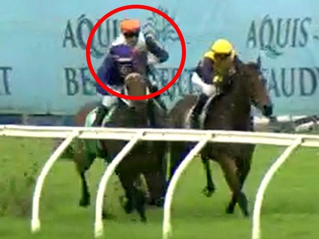 Quade (Jag Guthman-Chester, circled) was elevated from second to first after stewards deemed he was tightened by Beachside Babe (Andrew Spinks, yellow cap) at the 300m. Picture: Screengrab / Racing Queensland