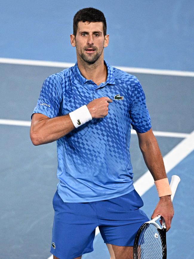 Novak Djokovic celebrates his 10th title. Picture: Anthony Wallace/AFP