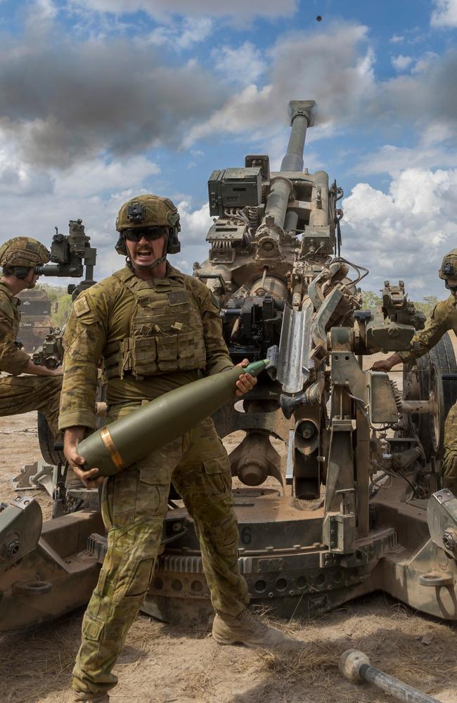 Australian Army soldiers from 8/12 Regiment, Royal Australian Artillery, 102nd (Coral) Battery fire the M777A2 Howitzer during Exercise Predators Run at Mount Bundey Training Area, NT.