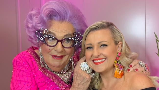 Angela Bishop with the late Barry Humphries as Dame Edna.