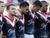 Anzac Day NRL Match. St George Illawarra Dragons v the Sydney City Roosters at Allianz Stadium today. Pictured are the Roosters players during a minutes silence.