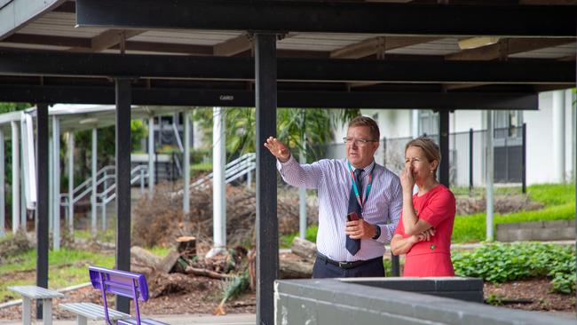 Education Minister Di Farmer and Principal James Forrest view the damage at Helensvale State School. Photo: Qld State Government