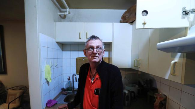 Public housing tenant David Cummins in his flat at Waterloo in Sydney. Picture: John Feder/The Australian