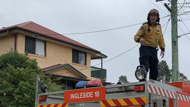 The Lawson family from Narrabeen bumped into former prime minister Tony Abbott while volunteering with the Rural Fire Service at Milton while he was on duty fighting bush fires on the NSW south coast. Picture: Sarah Lawson