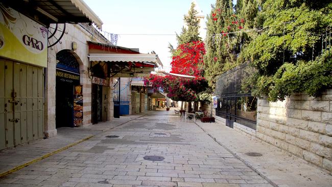 An empty street in Jerusalem that would normally be packed with people.