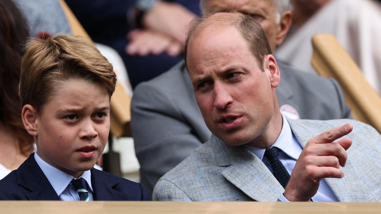 William and son George during the men’s finals at Wimbledon. Picture: AFP