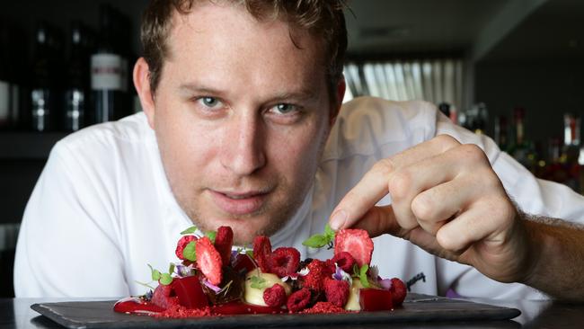 Little Truffle owner/chef Daniel Ridgeway with a white and dark chocolate mousse. Picture: Luke Marsden.