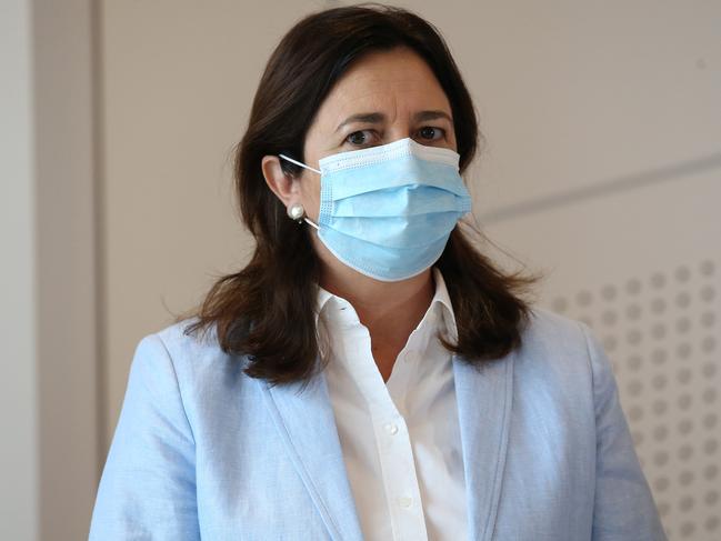 BRISBANE, AUSTRALIA - JANUARY 09: Queensland Premier Annastacia Palaszczuk is seen wearing a mask during a press conference on January 09, 2021 in Brisbane, Australia. Greater Brisbane is under a three-day lockdown until 6 pm on Monday, January 12 after a cleaner working at one of the city's quarantine hotels tested positive for a new variant of the COVID-19 strain that originated in the UK. According to reports, Queensland has recorded no new cases of coronavirus overnight as Brisbane residents remain under lockdown. (Photo by Jono Searle/Getty Images)