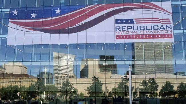 The skyline of downtown Cleveland, Ohio is reflected on the windows of the convention centre.