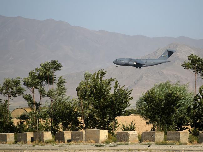 A US military air force lands at a US military base in Bagram, some 50 km north of Kabul on July 1, 2021. (Photo by WAKIL KOHSAR / AFP)
