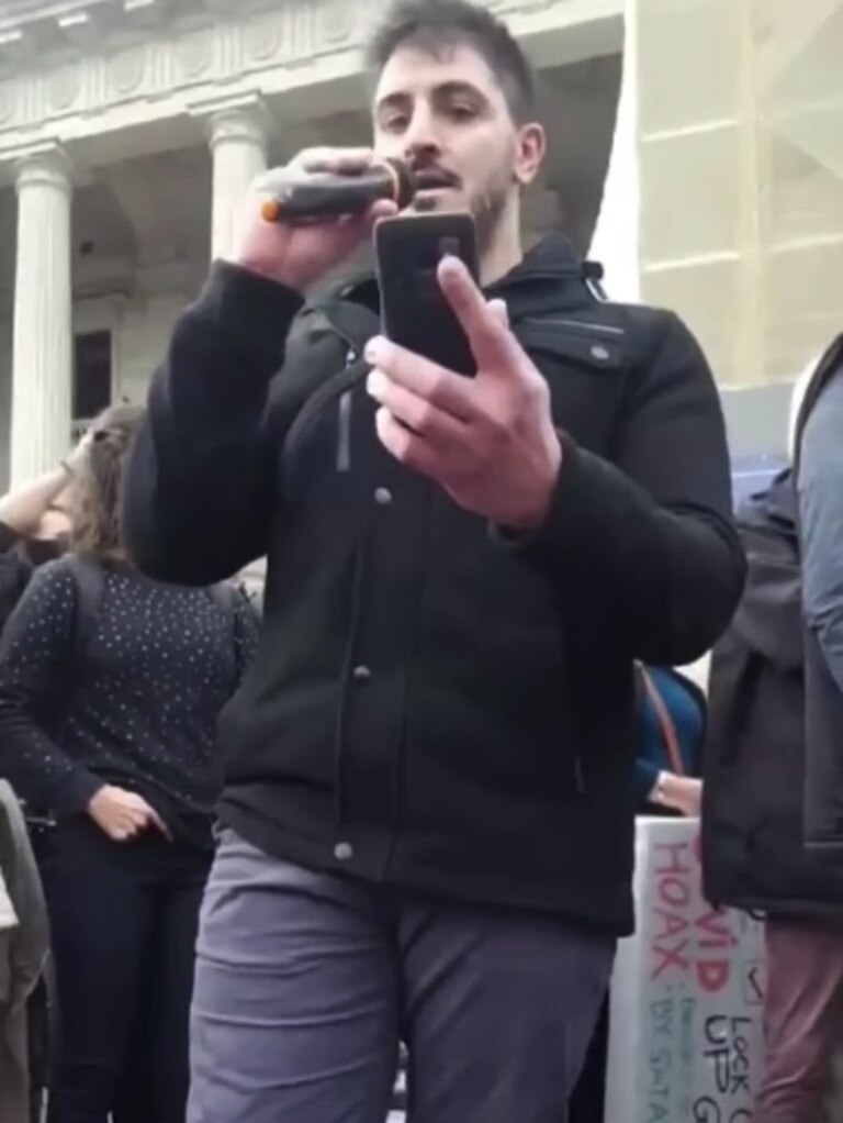 Mr Panayides speaks at an anti-lockdown protest.