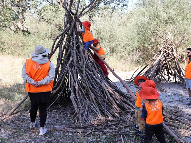 Parents “love” that children are allowed to engage in risky play including climbing these stick huts.