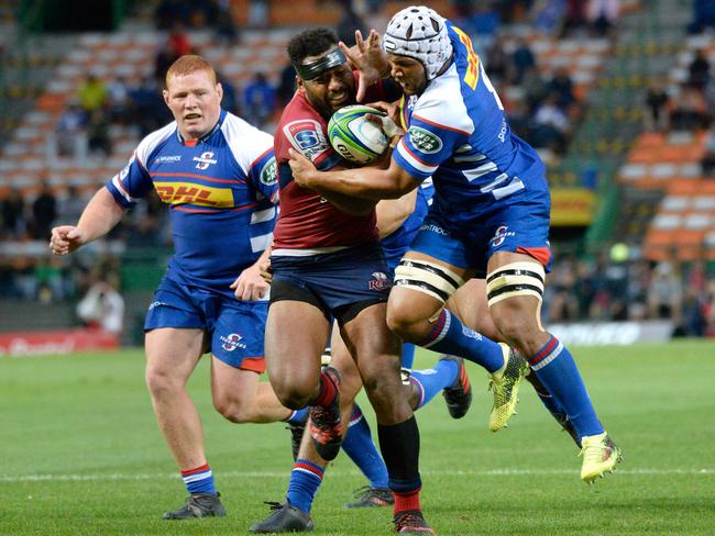 Reds centre Samu Kerevi fights off Stormers forward Nizaam Carr.