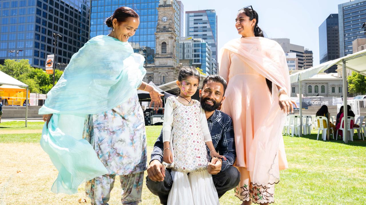 Kulveer Kaur, Avreen, 5, Ramandeep and Sukhjeet Kaur from Findon at the Indian Mela festival in Victoria Square. Picture: Morgan Sette