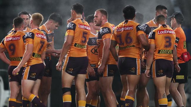 Dejected Brisbane players after a try by Souths Adam Reynolds during the Souths v Broncos NRL match at ANZ Stadium, Homebush. Picture: Brett Costello