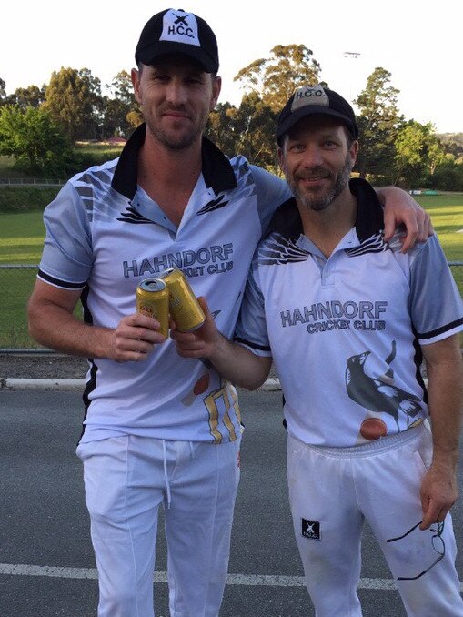 Shaun Tait and Greg Hassold induldge in the time-honoured cricket tradition of celebrating with a beer after both making centuries for Hahndorf. Picture: Supplied