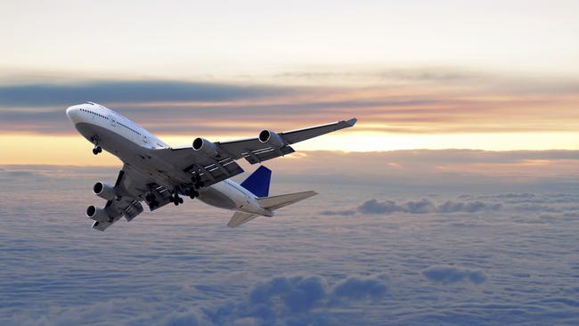 A plane flying above clouds and sunset. Picture: Thinkstock