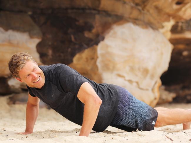 Dr Chris Brown does exercises which will benefit his everyday life. Picture: Tim Pascoe