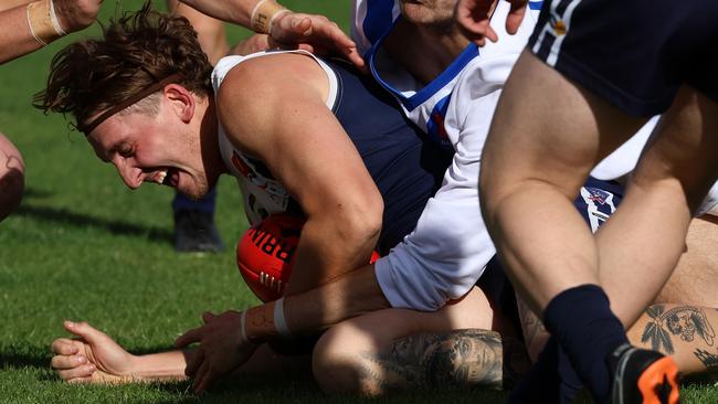 Ballarat: Jack Morrissey of Melton South taken down in a tackle. Picture: Hamish Blair