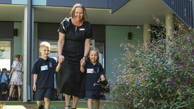 Our Lady of Lourdes prep students Vincent Woodall and Maggie Todd with principal Bridget Trenerry on the first day of school, Wednesday, January 29, 2025. Picture: Kevin Farmer