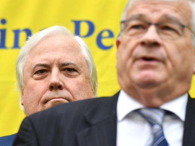 Former One Nation Senator Brian Burston and businessman Clive Palmer at a press conference to announce the formation of the United Australia Party at Parliament House in Canberra, Monday, June 18, 2018. (AAP Image/Mick Tsikas) NO ARCHIVING