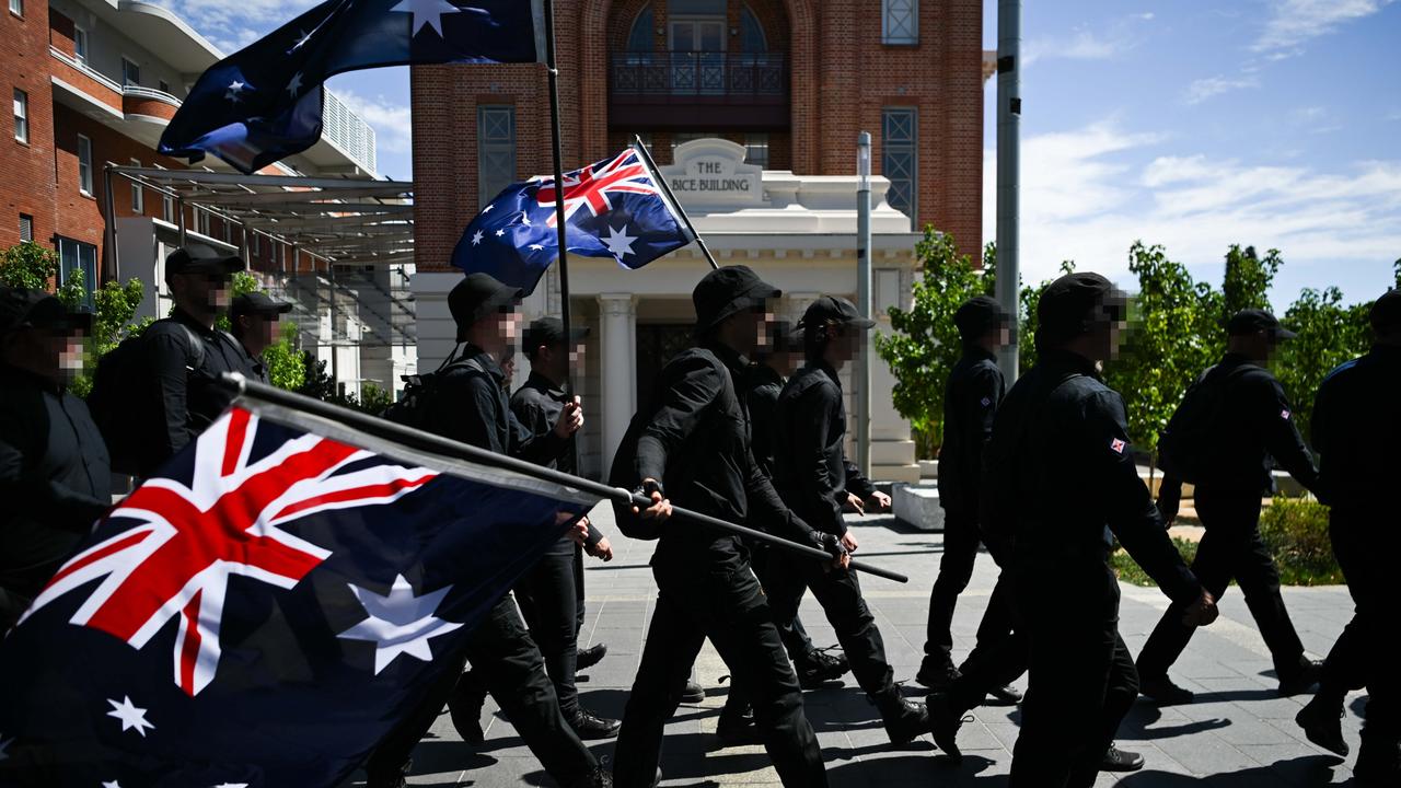 Members of the National Socialist Network marching through Adelaide on Australia Day. Picture: Tracey Nearmy/Getty Images