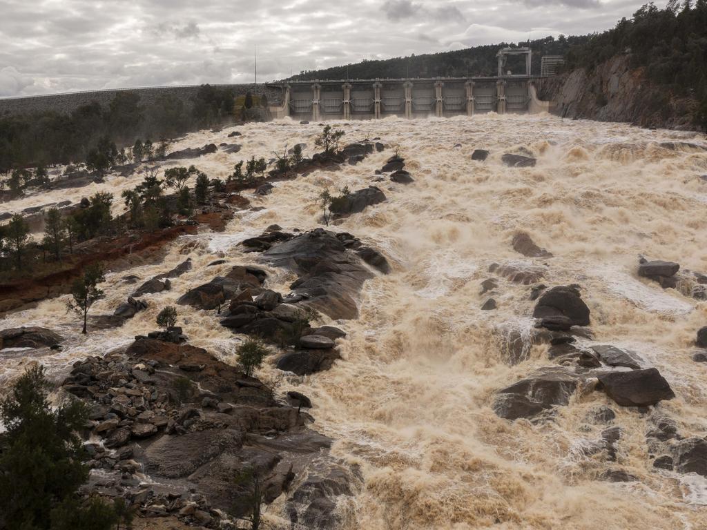 Water pour from the Wyangala Dam on Wednesday, contributing to widespread flooding.