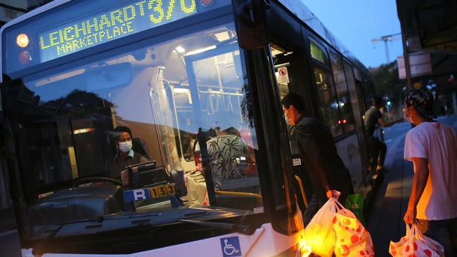 A bus driver wearing a mask as a preventative measure. Picture: Steven Saphore.