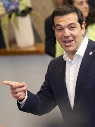 Given a Sunday deadline ... Greek Prime Minister Alexis Tsipras gestures as he leaves the emergency summit of eurozone leaders. Picture: AP Photo/Michel Euler