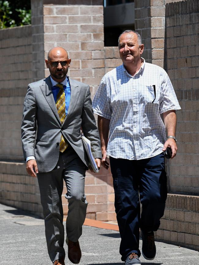 Lawyer Omar Juweinat and former Labor NSW minister Milton Orkopoulos are seen arriving at Waverley Local Court in Sydney (AAP Image/Bianca De Marchi)