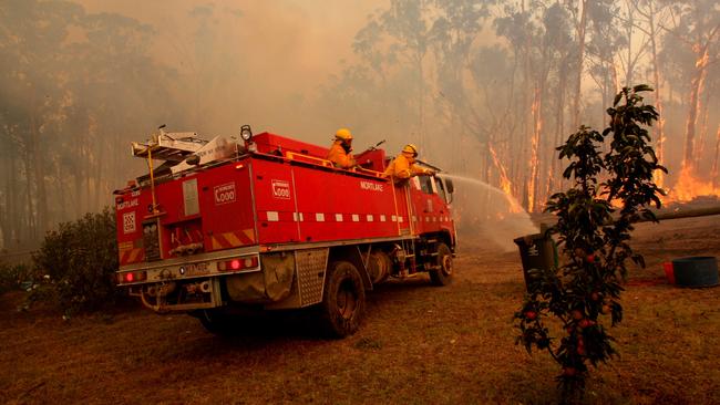 Firefighters tackle the fire near Churchill.