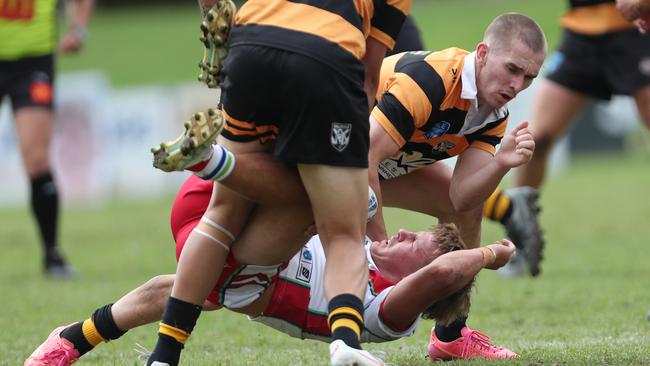 Monaro’s Joey Elton being tackled by Jordan Hamlin. Picture: Sue Graham